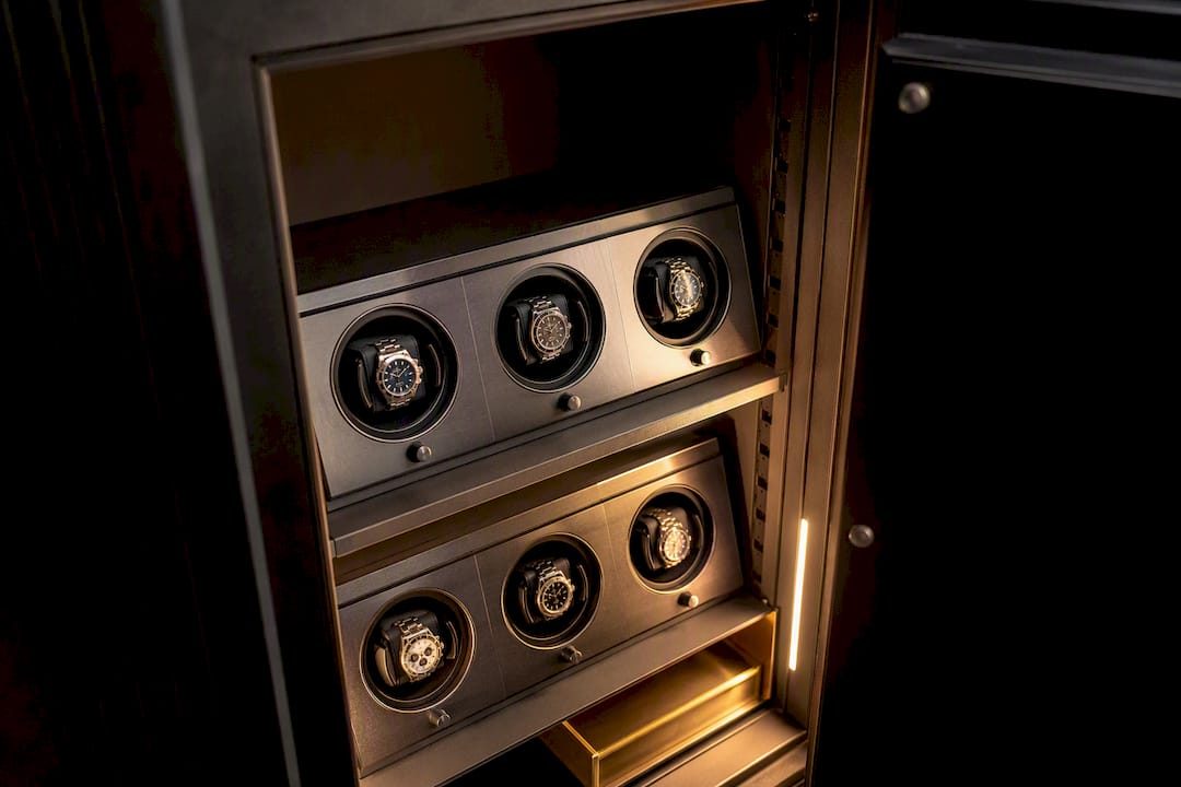 Watch winders arranged inside a security safe